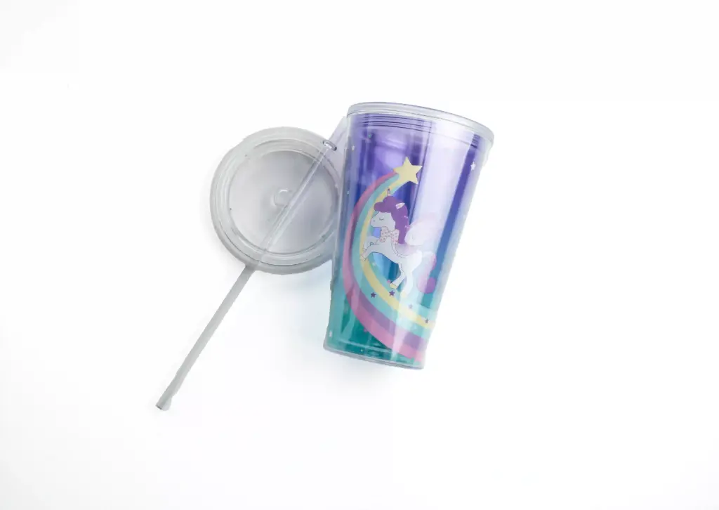 A bottle with a straw