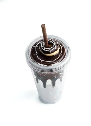 A bottle with a straw